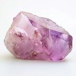 Raw kunzite gemstone displaying a captivating blend of pink and purple hues with polished facets. suitable for jewelry design, mineral collection, and educational purposes. the layered structure and natural imperfections highlight the beauty of this semiprecious crystal.